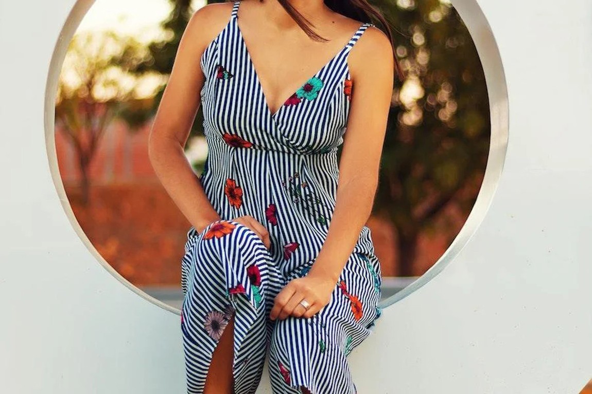 woman-sitting-with-a-striped-loose-unitard.webp.jpg