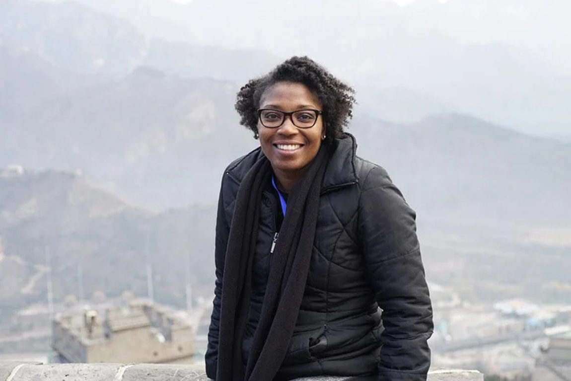 lady-with-glasses-wearing-a-black-puffer-jacket.webp.jpg