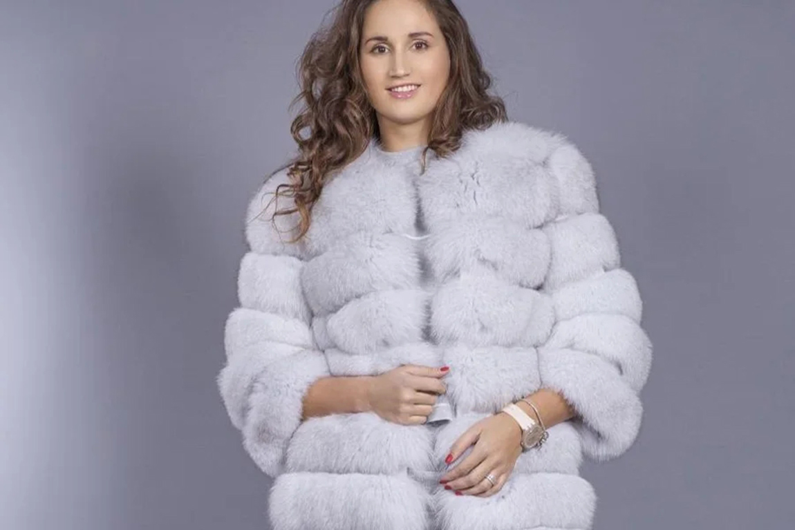 woman-wearing-a-white-fur-coat.webp.jpg