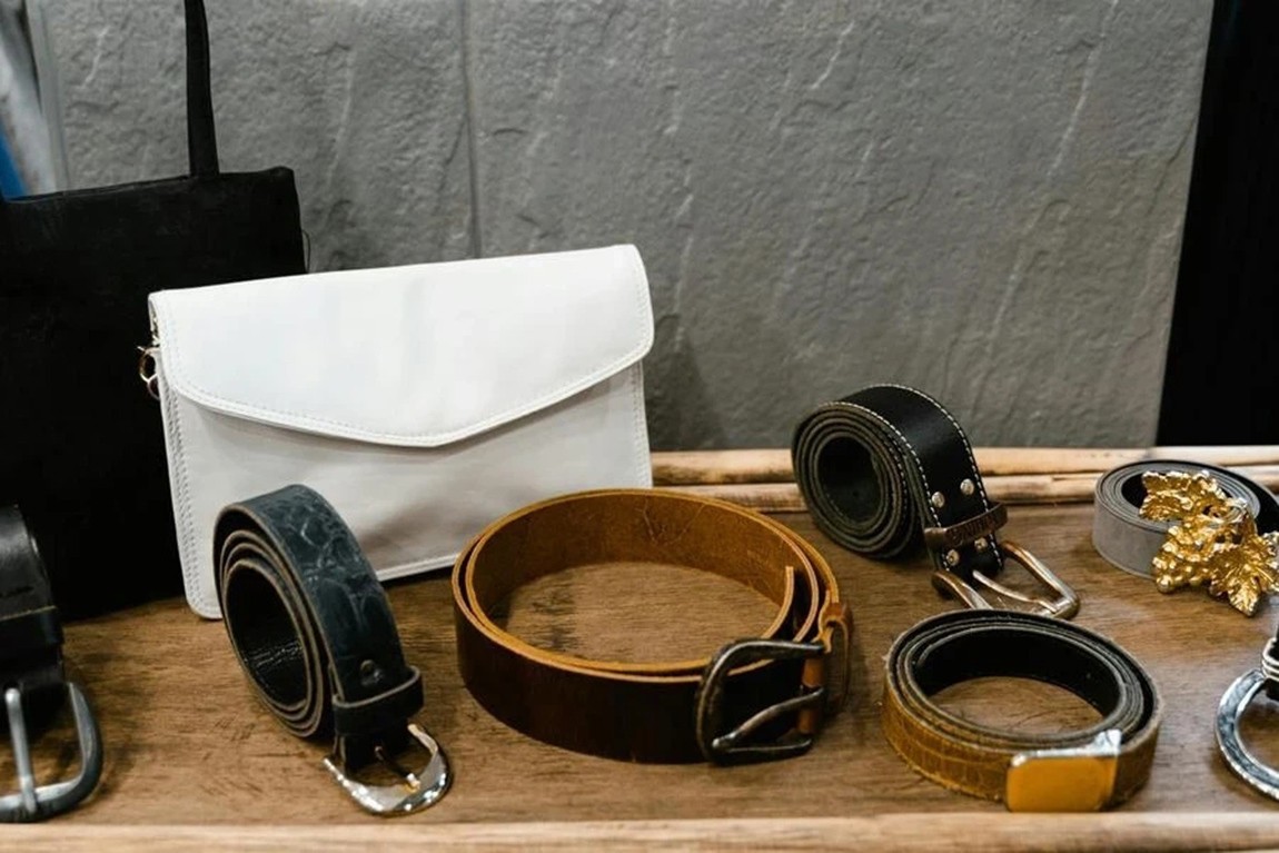 Assorted-leather-products-on-a-wooden-table.webp.jpg
