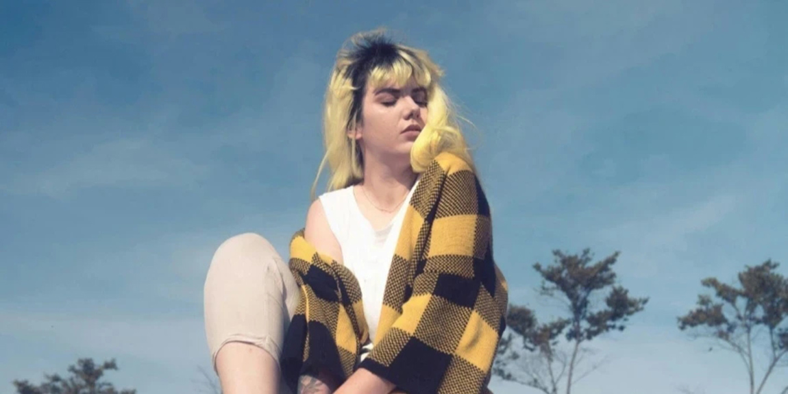 Photo-of-Woman-Wearing-Cardigan.webp.jpg
