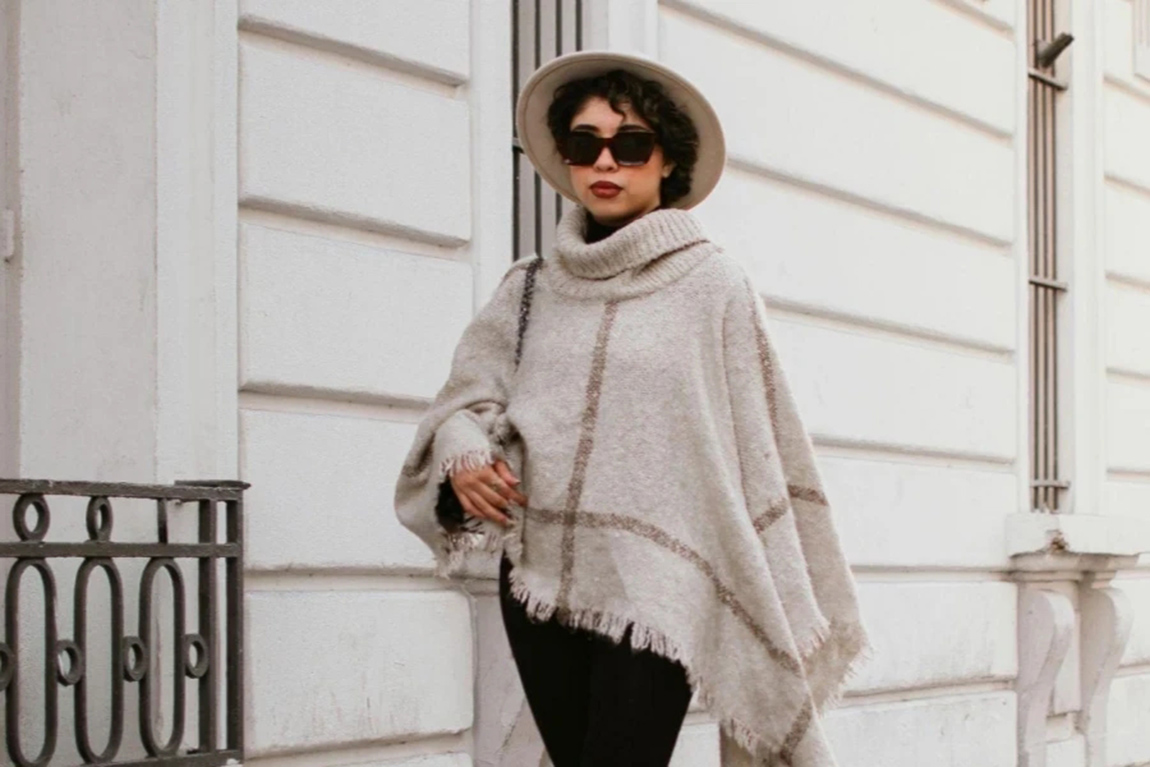 A-Fashionable-Woman-Walking-on-a-Sidewalk.webp.jpg