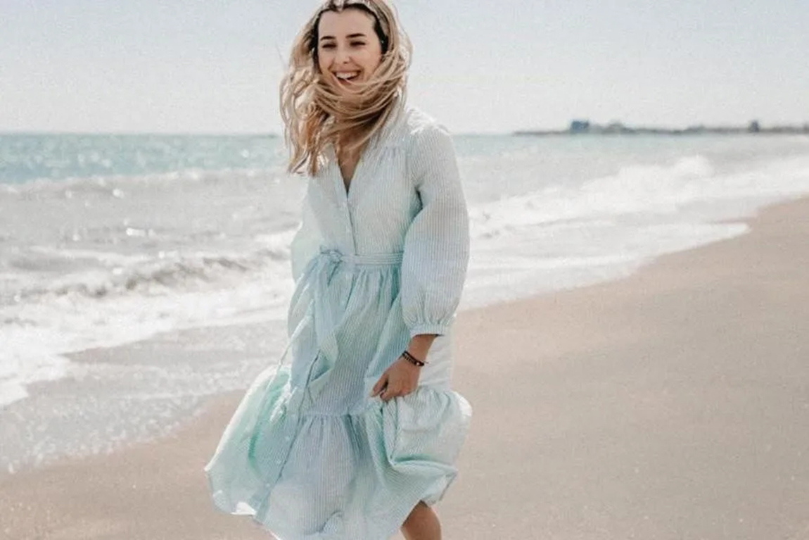lady-wearing-a-tranquil-blue-maxi-dress.webp.jpg