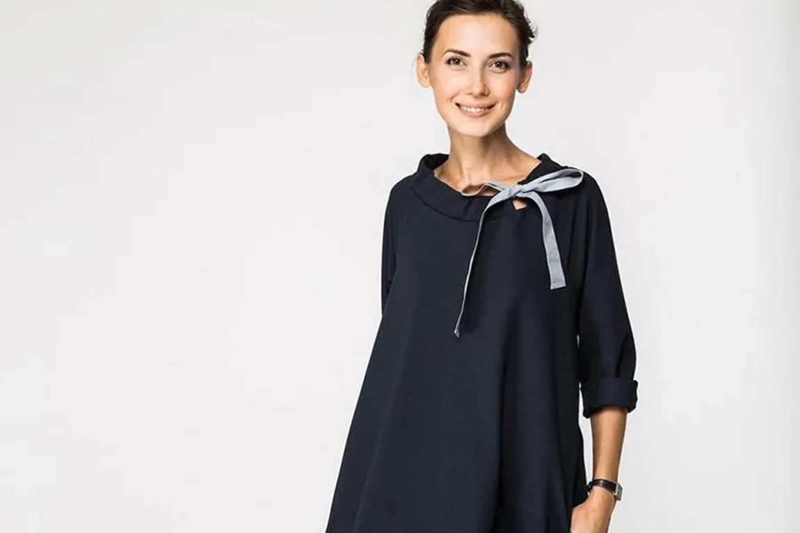 lady-wearing-a-minimalist-French-navy-dress.webp.jpg