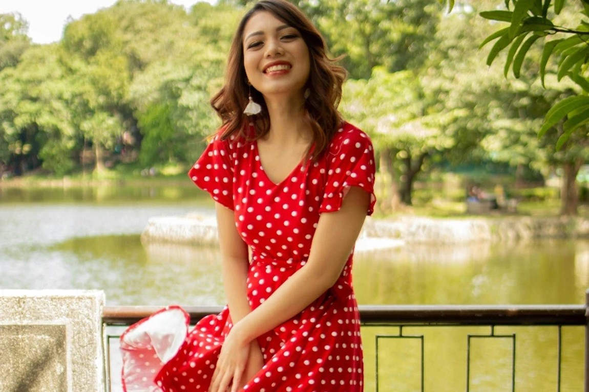 Smiling-Woman-in-Red-and-White-Polka-dot-Dress-by-Jv-Franes.webp.jpg
