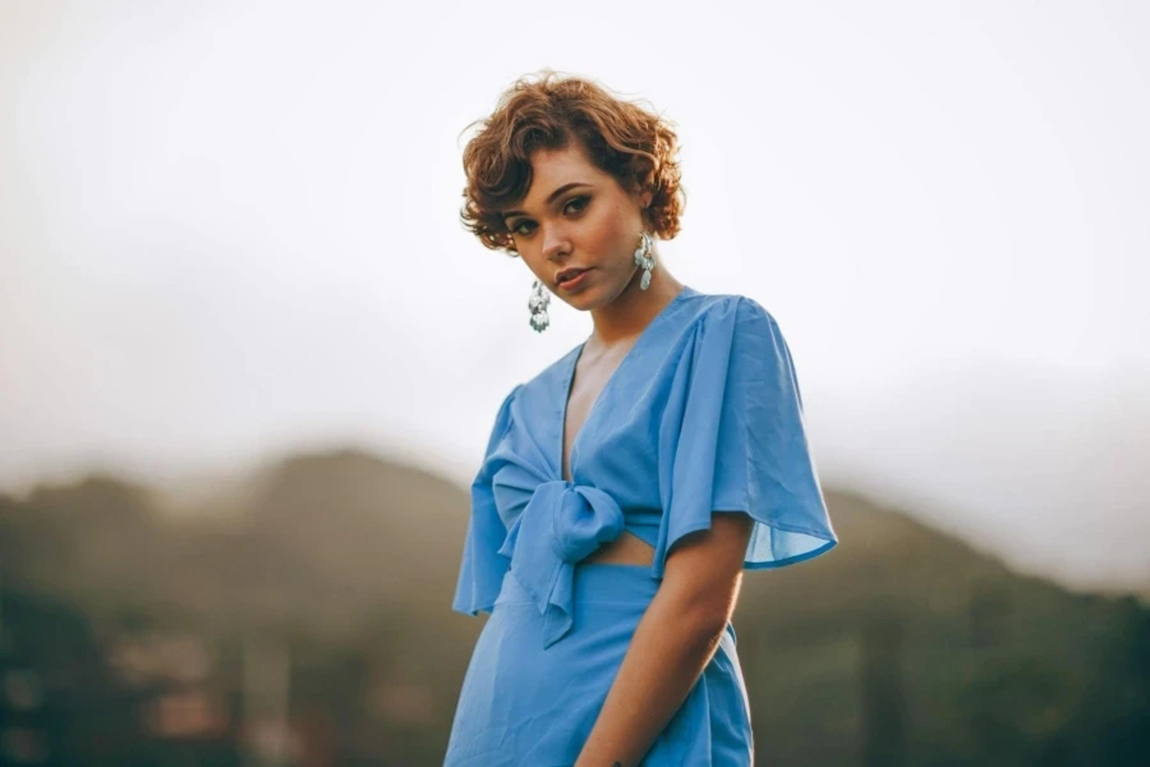 Selective-focus-photography-of-woman-in-blue-crop-top-standing.webp.jpg