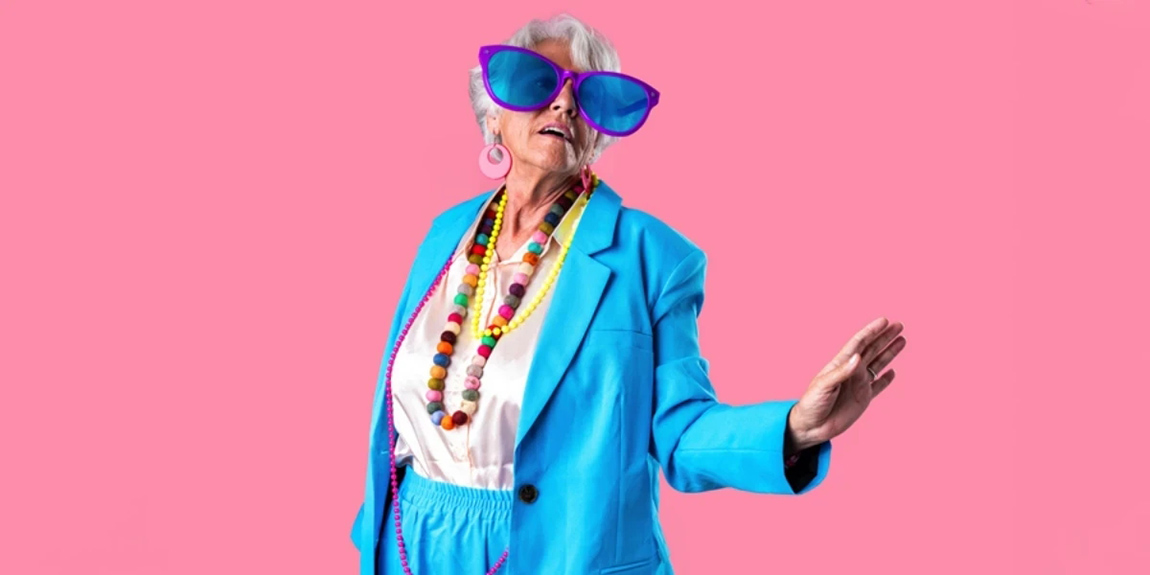 A-beautiful-senior-woman-in-1980s-clothings.webp.jpg