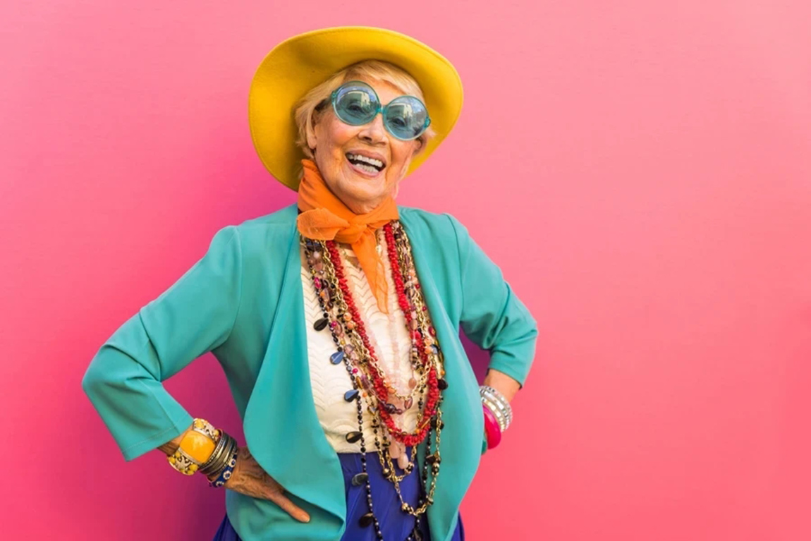 A-senior-woman-in-fancy-80s-fashion-and-accessories.webp.jpg
