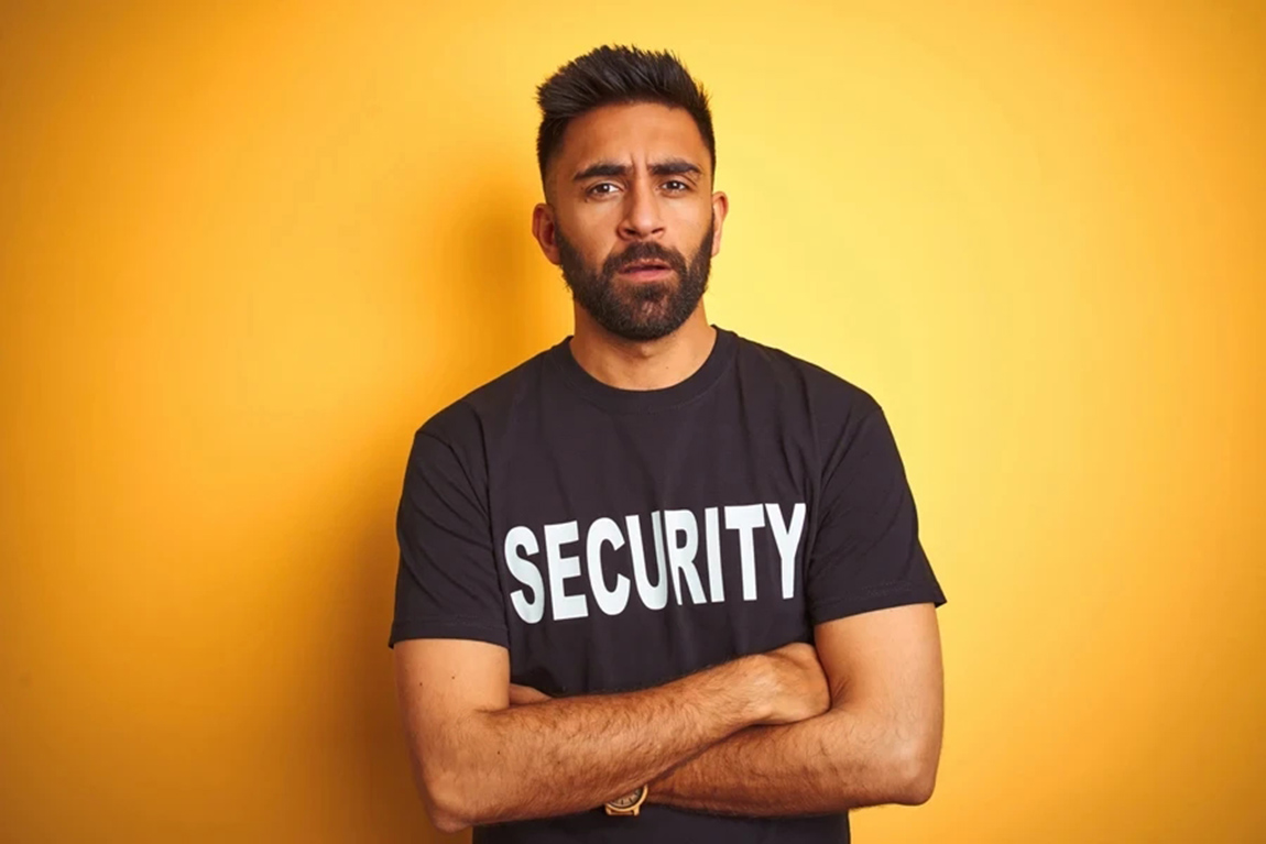 A-man-wearing-a-branded-work-T-shirt.webp.jpg