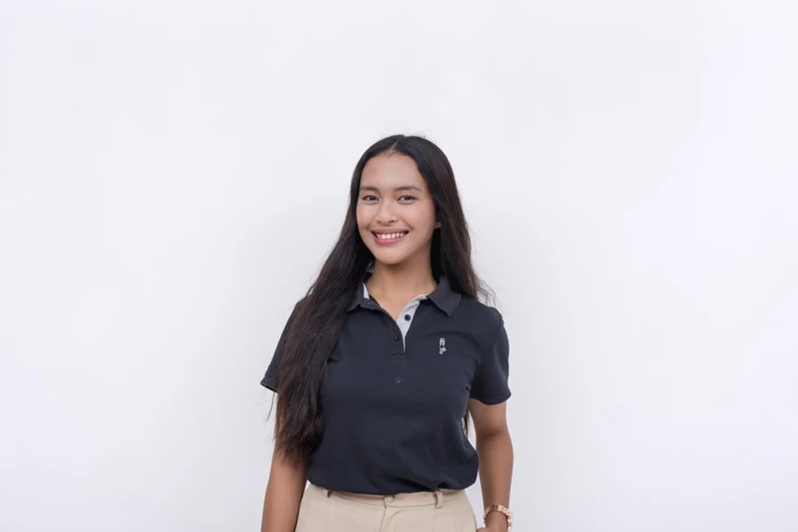 Lady-wearing-an-embroidered-tiny-chest-patch-shirt.webp.jpg