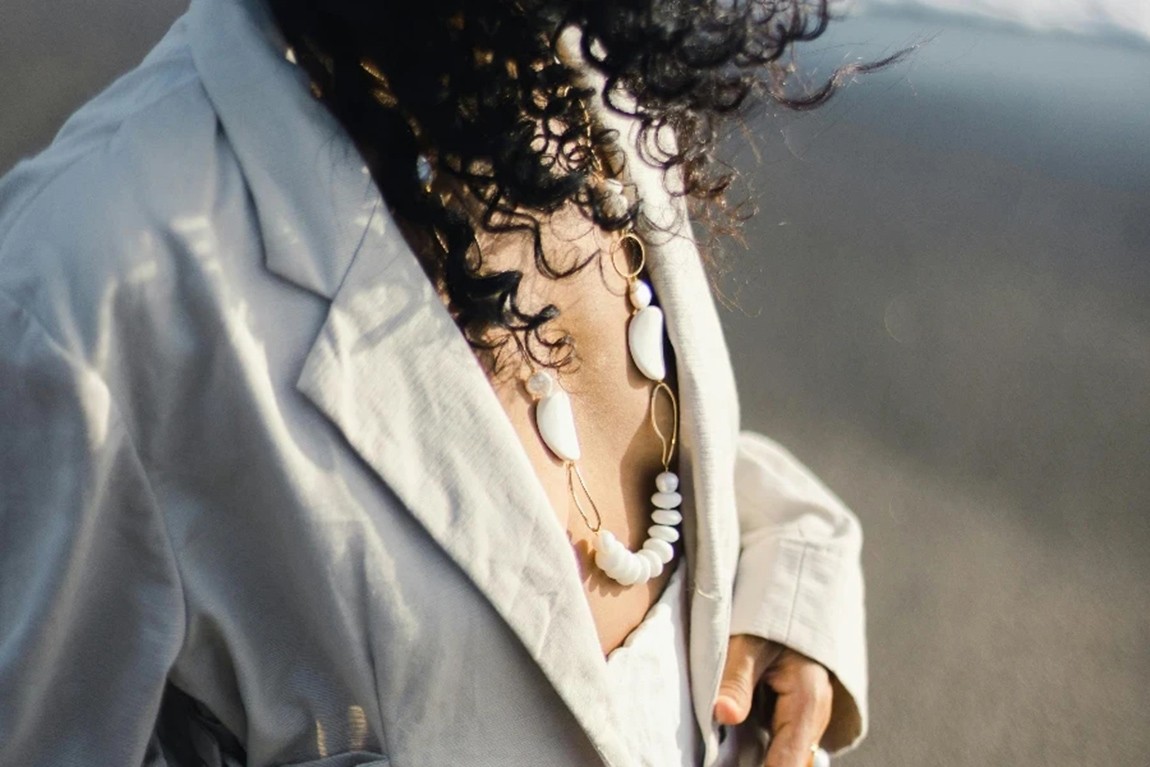 Crop-unrecognizable-stylish-woman-with-accessories-on-sea-shore-by-Agung-Pandit-Wiguna.webp.jpg