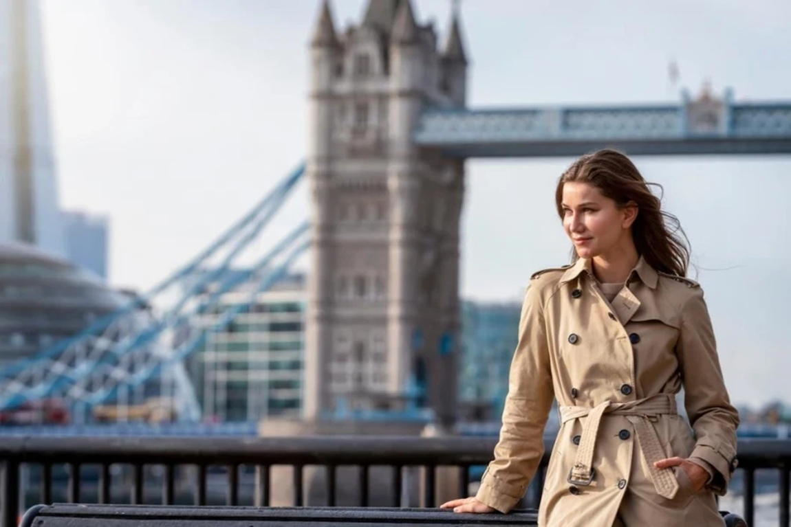 A-woman-outdoors-in-a-trench-jacket.webp.jpg