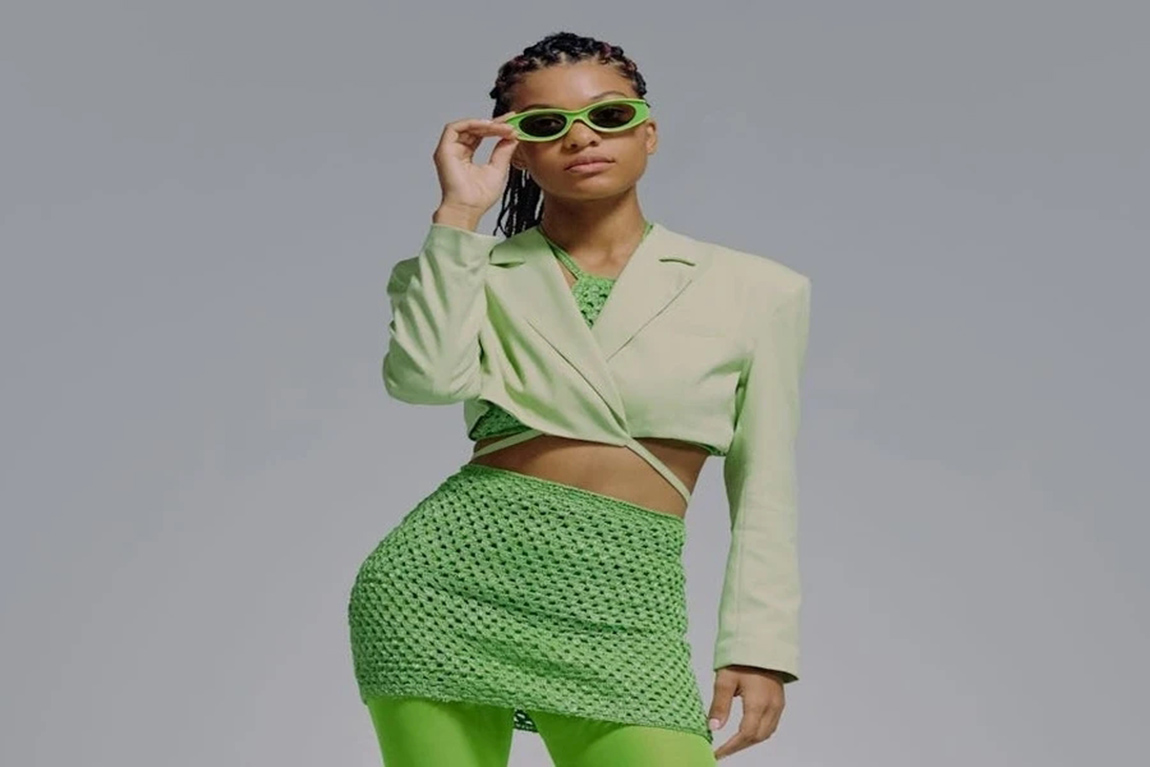 A-young-woman-wearing-a-green-cropped-blazer.webp.jpg