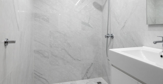 亮面精雕通体大理石瓷砖 卫生间防水能用多少年